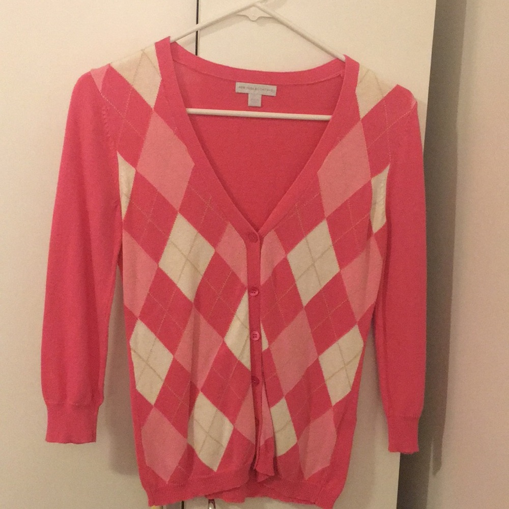 Pink and white argyle cardigan. Button up.